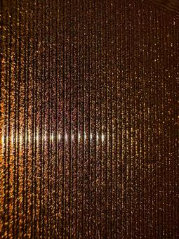 金色ラメの縦線 グリッター,ラメ,金色の写真素材