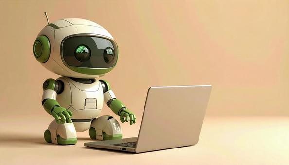 パソコンとロボットのおもちゃ パソコンとロボットのおもちゃの写真
