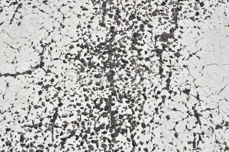 アスファルトひび割れ 質感,アスファルト,あばたのあるの写真素材