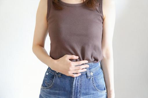 お腹を抑える女性 腹痛 お腹を抑える女性 腹痛 お腹,腹痛,胃痛の写真素材