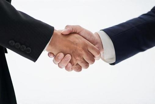 Asian business person shaking hands on a white background, handshake, success, close, JPG