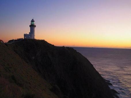 バイロンベイでの朝焼け 灯台,朝焼け,朝日の写真素材
