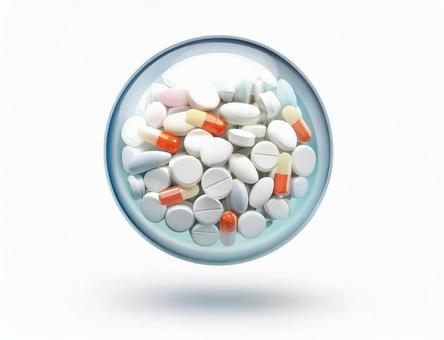 ガラスの球体に詰まった錠剤 ガラスの球体に詰まった錠剤の写真