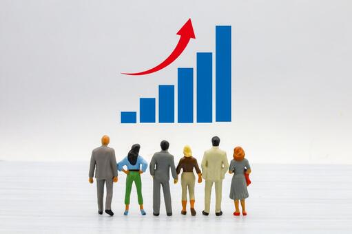 上昇グラフを見つめるビジネスパーソン 上昇,右肩上がり,業績アップの写真素材