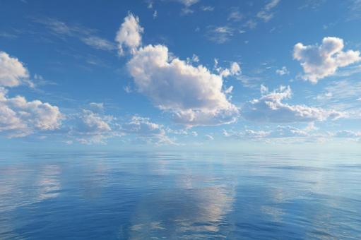 青い空と白い雲が広がる穏やかな海 青い空と白い雲が広がる穏やかな海の写真
