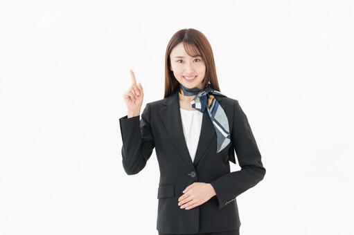 白バックの若い女性コンシェルジュ コンシェルジュ,ビジネス,女性の写真素材