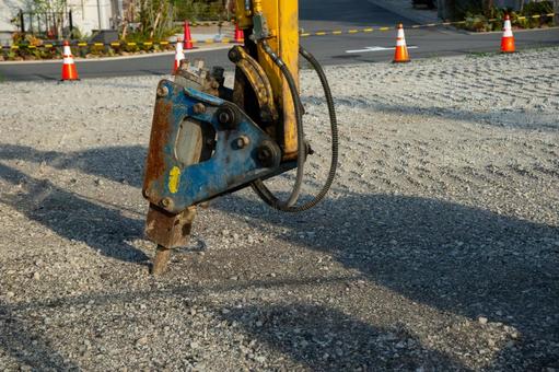 油圧ブレーカーの先端アタッチメント 油圧ブレーカーの先端アタッチメント 工事,工事現場,道路の写真素材