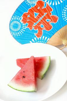 夏のイメージ すいかとうちわ 夏のイメージ すいかとうちわ 夏,盛夏,夏のイメージの写真素材
