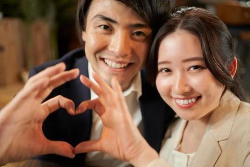 Asian couple making a heart symbol with their fingers, JPG Asian couple making a heart symbol with their fingers, heart, heart mark, hand, JPG
