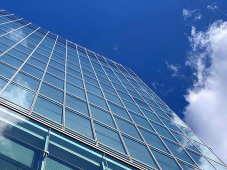 Buildings, blue sky and clouds, JPG
