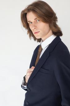 スーツの胸元に手を入れている男性 男性,外国人,欧米人の写真素材