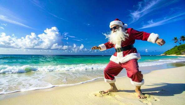 ビーチで踊る　サングラスのサンタクロースの写真