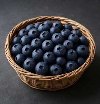 たっぷりのブルーベリーが入ったザルの写真