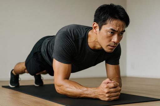 体幹トレーニング中の男性 体幹トレーニング中の男性の写真