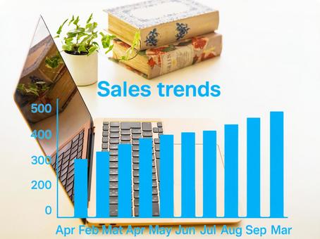 ノートパソコン、観葉植物、売上推移グラフ ノートパソコン、観葉植物、売上推移グラフ ノートパソコン,売上推移,作業環境の写真素材