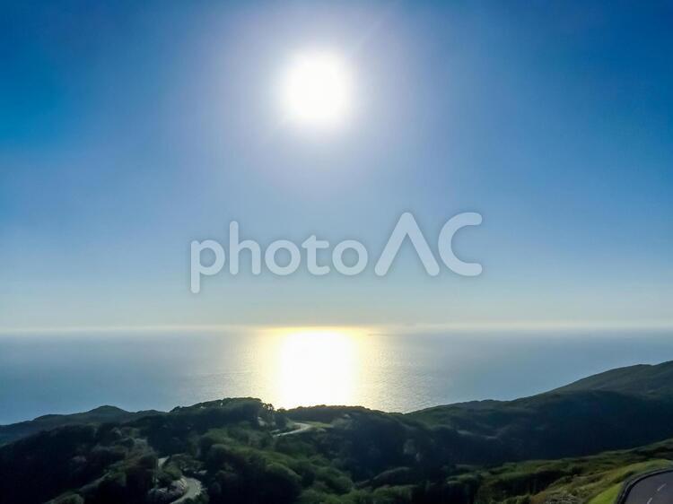海と空と太陽と山 太陽,空,海の写真素材
