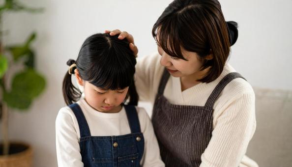 子育てに悩む主婦 子育てに悩む主婦の写真