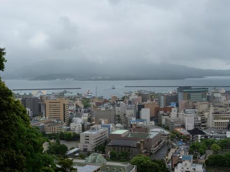 城山から望む鹿児島市街地と桜島 城山から望む鹿児島市街地と桜島 鹿児島市,城山,西郷隆盛の写真素材