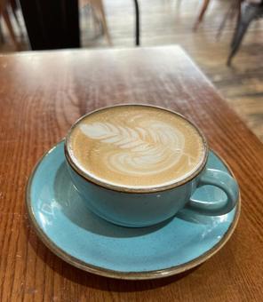 ラテアートが描かれたカフェラッテ ラテアートが描かれたカフェラッテの写真