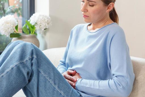 生理痛でお腹が痛い女性 生理,月経,女性の写真素材