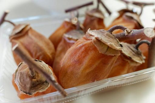 パックの中の干し柿 干し柿,スイーツ干し柿,柿の写真素材