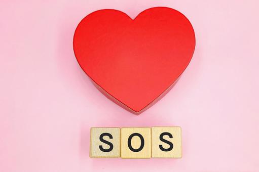 ハートとSOSの文字 ハートとSOSの文字 sos,悩み,ハートの写真素材