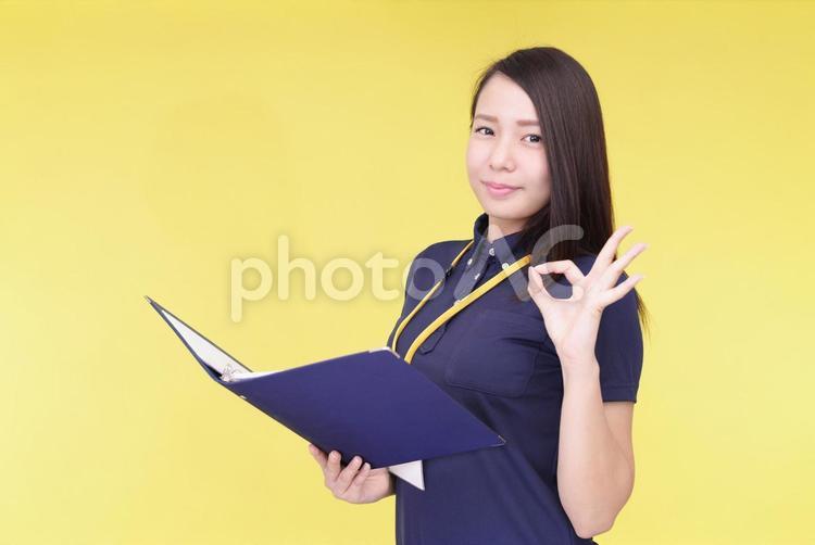 OKサインの女性スタッフ 仕事,ビジネス,女性の写真素材