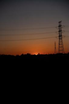 黄昏時の鉄塔風景 夕焼け,日の入り,夕暮れの写真素材