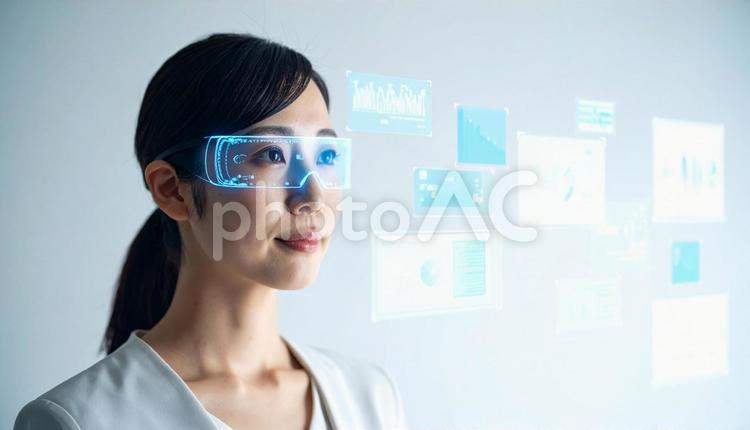 ホログラムのAR書類を確認する女性 ar,vr,仮想現実の写真素材