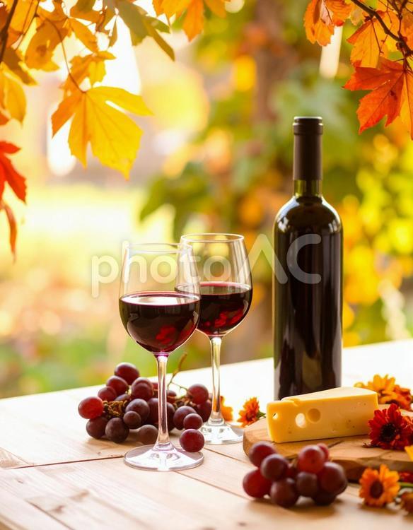ワインボトルとグラスと紅葉のテーブル演出 ワイン,赤ワイン,ワインボトルの写真素材