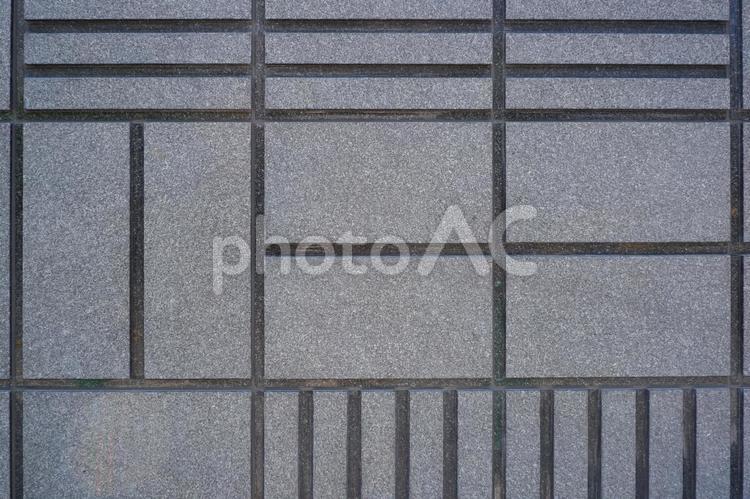 グレーの石壁、背景素材 壁,住宅,ビルの写真素材