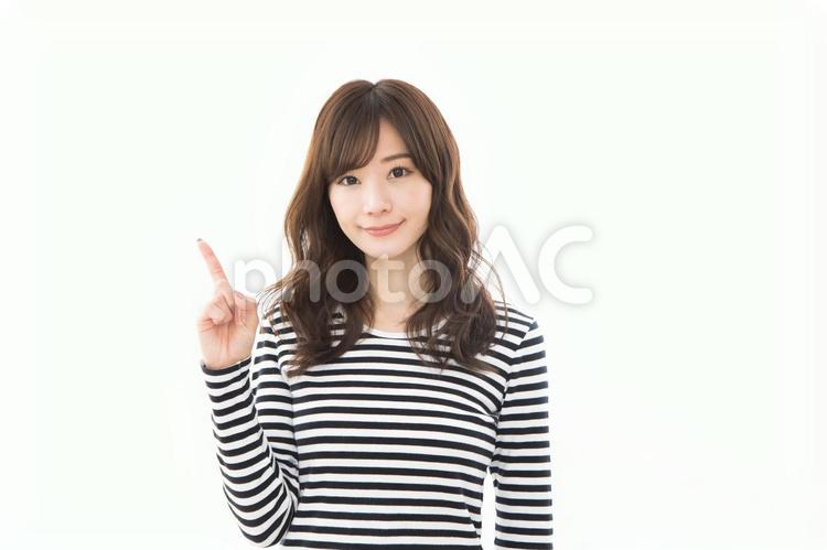 指差し、ワンポイント、アドバイス、伝える 女性,人物,指差しの写真素材