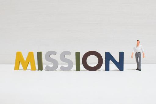 ミッションの文字とビジネスマン① ミッションの文字とビジネスマン① mission,ミッション,仕事の写真素材