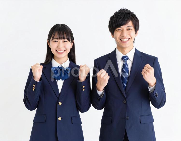 ガッツポーズで励ます男女高校生のイメージ 高校生,エール,励ますの写真素材