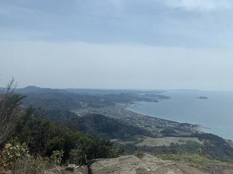 山頂からの絶景と海岸線の眺望 山頂からの絶景と海岸線の眺望の写真