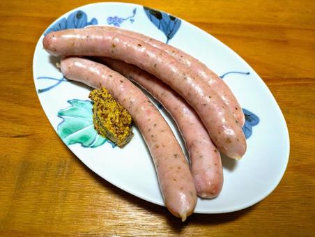粒マスタードを添えたソーセージ 粒マスタードを添えたソーセージの写真