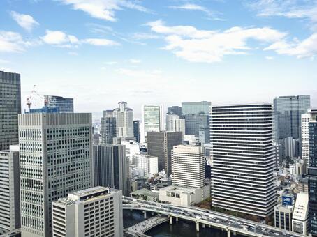 青空に広がる都会の高層ビル群 都市,高層ビル,都会の写真素材