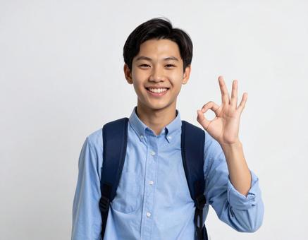 OKのサインをする男性ビジネスマンの笑顔 OKのサインをする男性ビジネスマンの笑顔の写真
