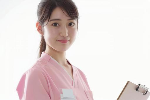 若手女性看護師の笑顔ポートレート 若手女性看護師の笑顔ポートレートの写真