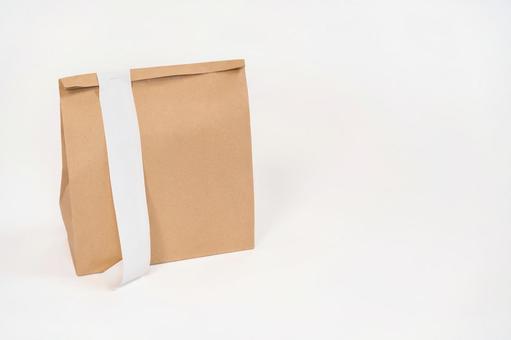 レシートのついた紙袋 配達,フードデリバリー,デリバリーの写真素材