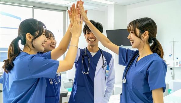喜びを分かち合う看護師・医者 喜びを分かち合う看護師・医者の写真