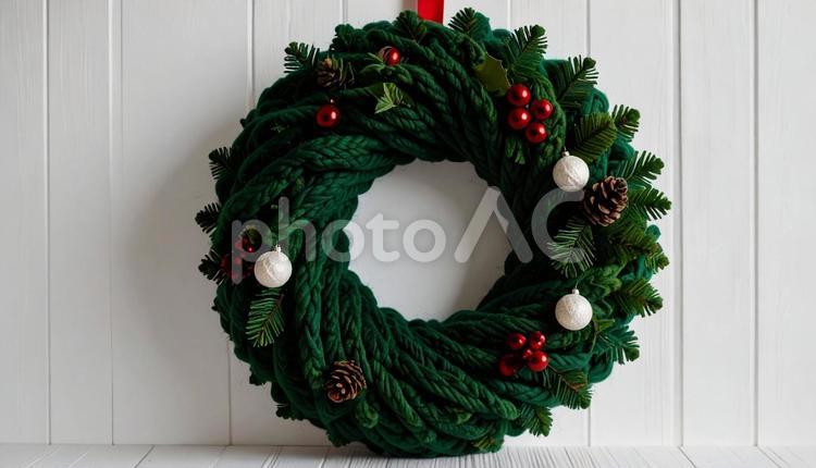 毛糸でできたクリスマスリース リース,クリスマスリース,毛糸の写真素材