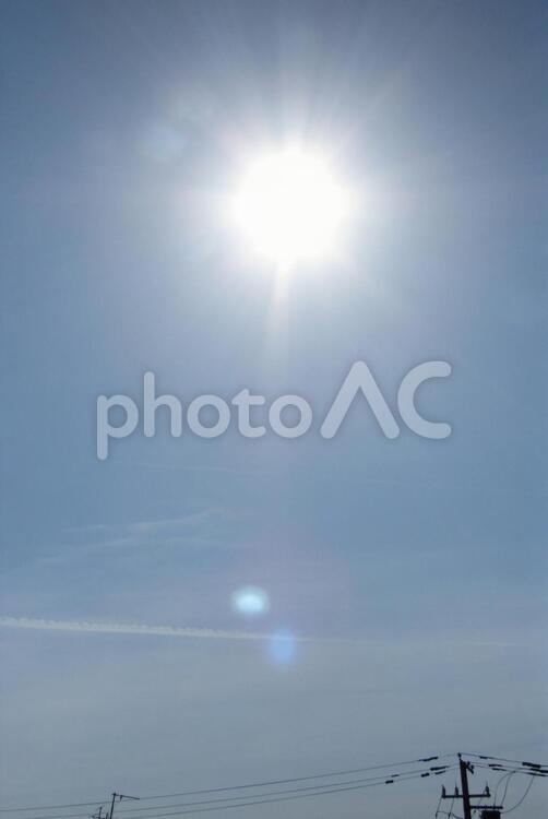 太陽と飛行機雲-58 飛行機,飛行機雲,太陽の写真素材