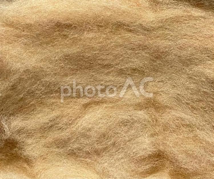 手芸用品・羊毛フェルト(キャラメル) 背景素材,素材,羊毛フェルトの写真素材