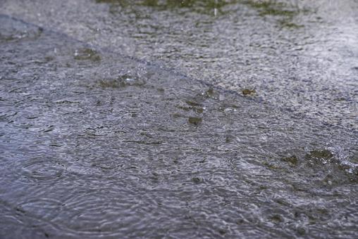 Raindrops hitting the paved road, JPG Raindrops hitting the paved road, JPG