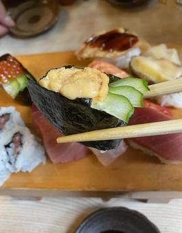 Sea urchin gunkanmaki sushi with red sea urchin, JPG