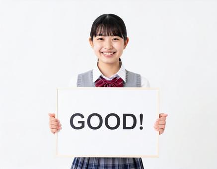 Goodと書いたボードを持つ女子生徒 Goodと書いたボードを持つ女子生徒の写真