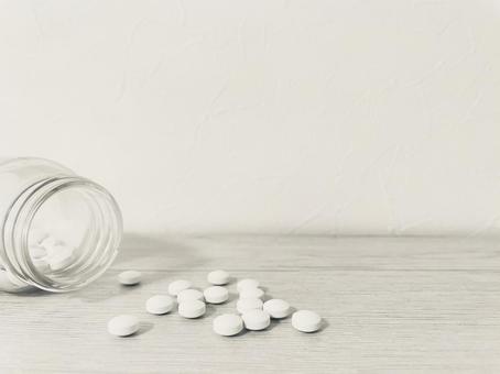 白いサプリメント 薬,錠剤,美容の写真素材