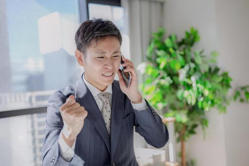 拳を握るビジネスマン 怒り,怒る,ビジネスマンの写真素材