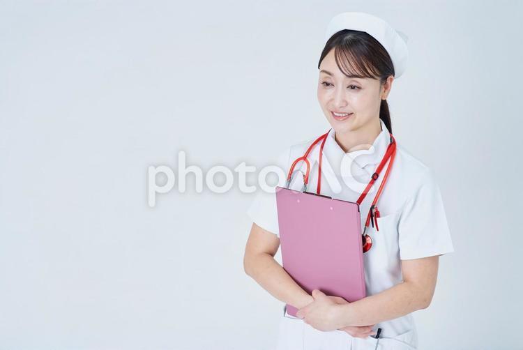 問診する医療スタッフの女性 問診,カルテ,質問の写真素材